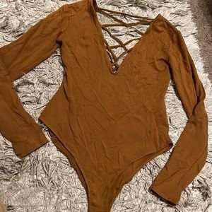 Asymmetrical bodysuit